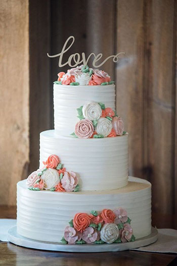 3 Tier textured buttercream wedding cake decorated buttercream flowers