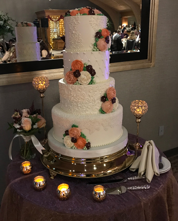 4 Tier buttercream wedding cakes, decorated with buttercream flowers, buttercream designs and edible sugar pearls delivered to Heritage Hills, York PA