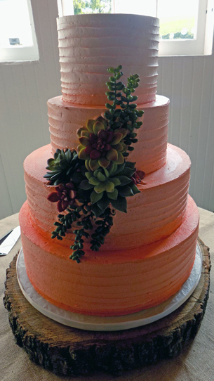 4 Tier buttercream peach ombre wedding cake decorated with succulents. Wedding Cakes Wrightsville PA