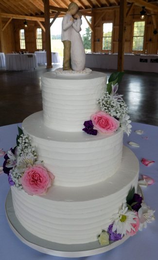 3 Tier textured rustic buttercream wedding cake, decorated with fresh flowers. Wedding Cakes White Hall MD