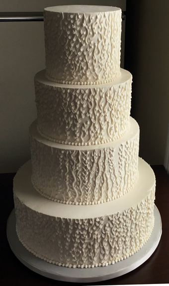 4 Tier textured buttercream wedding cake delivered at Stone Mill Inn Hallam PA