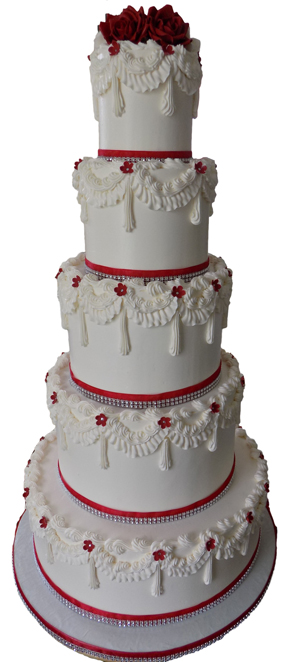 Five tier buttercream wedding cake decorated with buttercream swags, red and diamond bling ribbons and handmade red and white sugar roses and flowers - wedding cakes Wrightsville PA