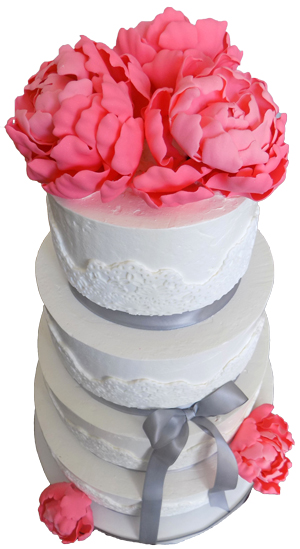 picture of 4 tier buttercream wedding cake, decorated with fondant lace, silver ribbons and handmade coral gumpaste peonies  delivered to the General Sutter Inn in Lititz PA. Wedding cakes Lititz PA