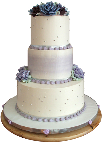 picture of 3 tier white and purple buttercream wedding cake delivered in York PA. Wedding cakes York PA